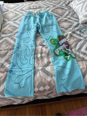 Lost Intricacy Ed Hardy Light Blue Sweatpants with Graphic Skull Design